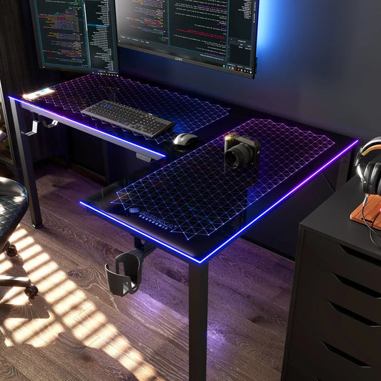 Modern gaming command center featuring the Eureka Ergonomic L-shaped glass desk with a dual monitor setup.