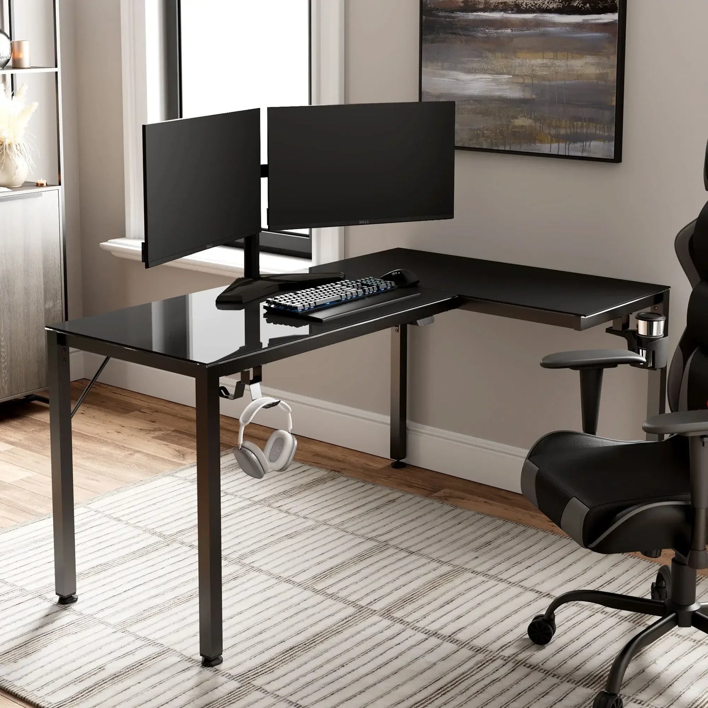Modern gaming command center featuring the Eureka Ergonomic L-shaped glass desk with a dual monitor setup.